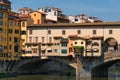 FLORENCE, ITALY Ã¢â¬â ÃÅÃÂY 25, 2017: River Arno and famous bridge Ponte Vecchio The Old Bridge at sunny summer day. Royalty Free Stock Photo